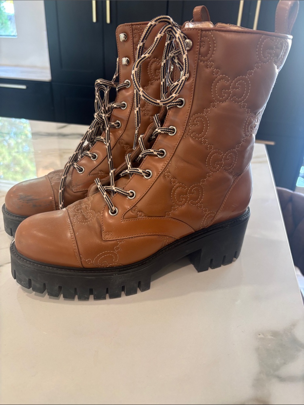 embossed Gucci boots size 40 1/2